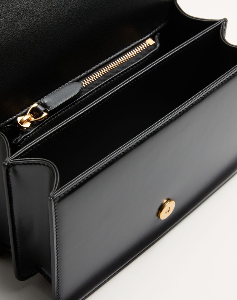 Bolsa de ombro pequena Valentino Garavani Vain em couro de bezerro brilhante