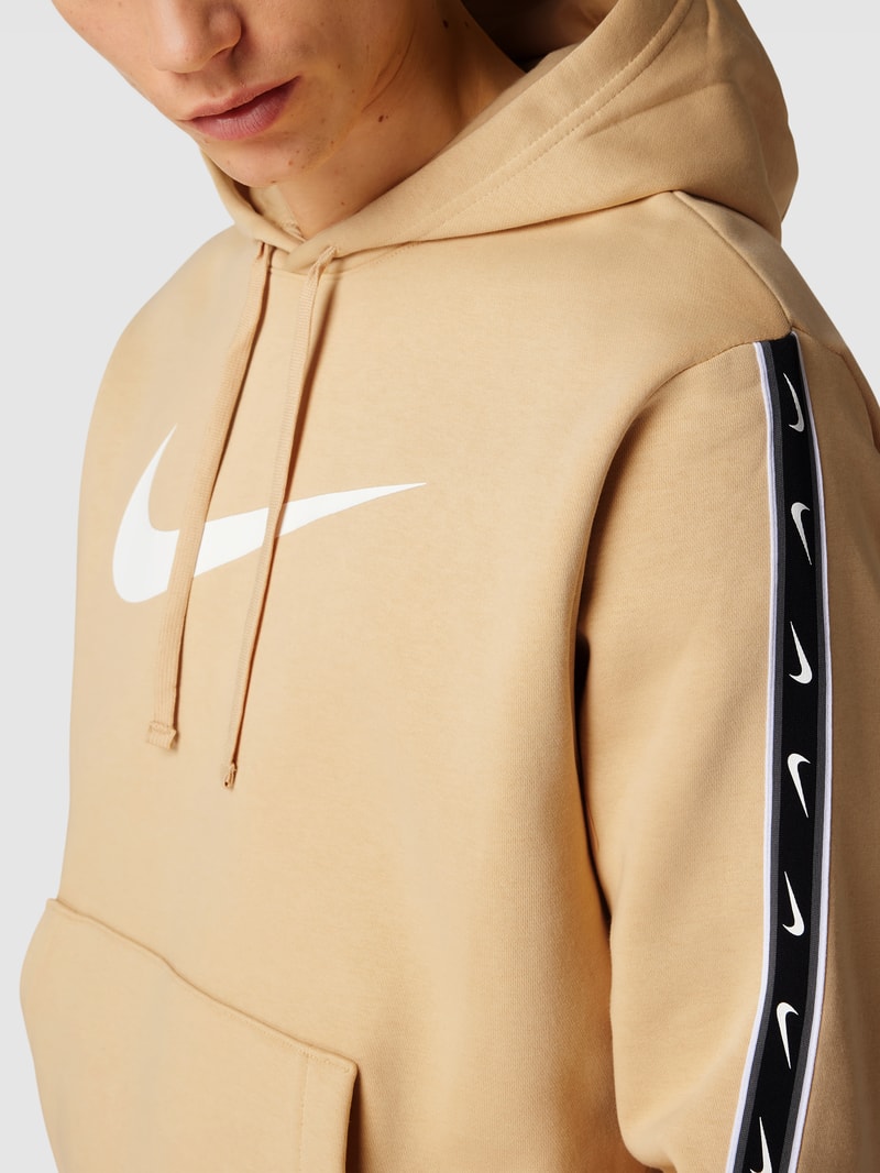 Hoodie mit Känguru-Tasche Modell 'Repeat' in beige