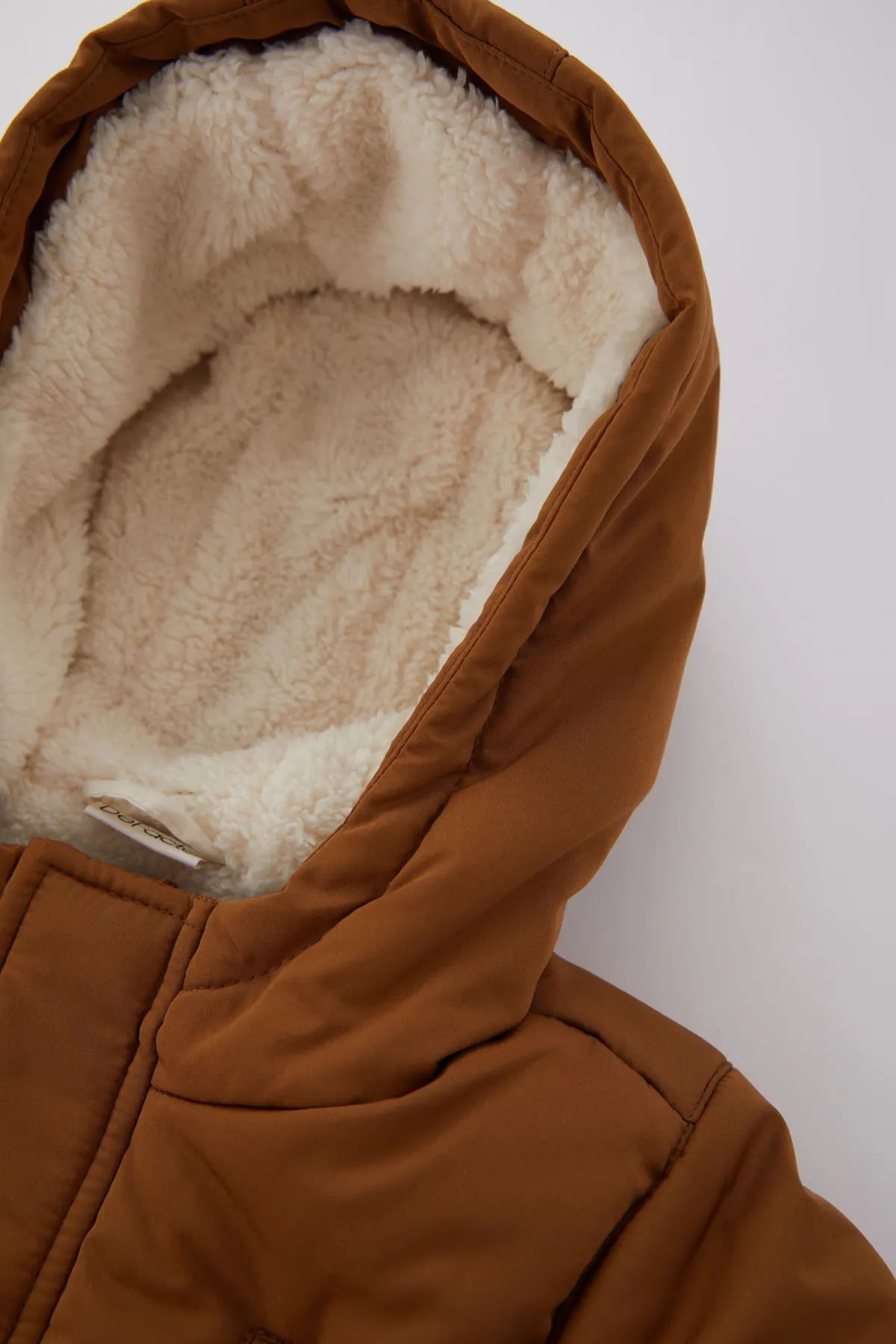 DeFacto  Wasserabweisender, mit Fleece gefütterter Kapuzenmantel für Babys