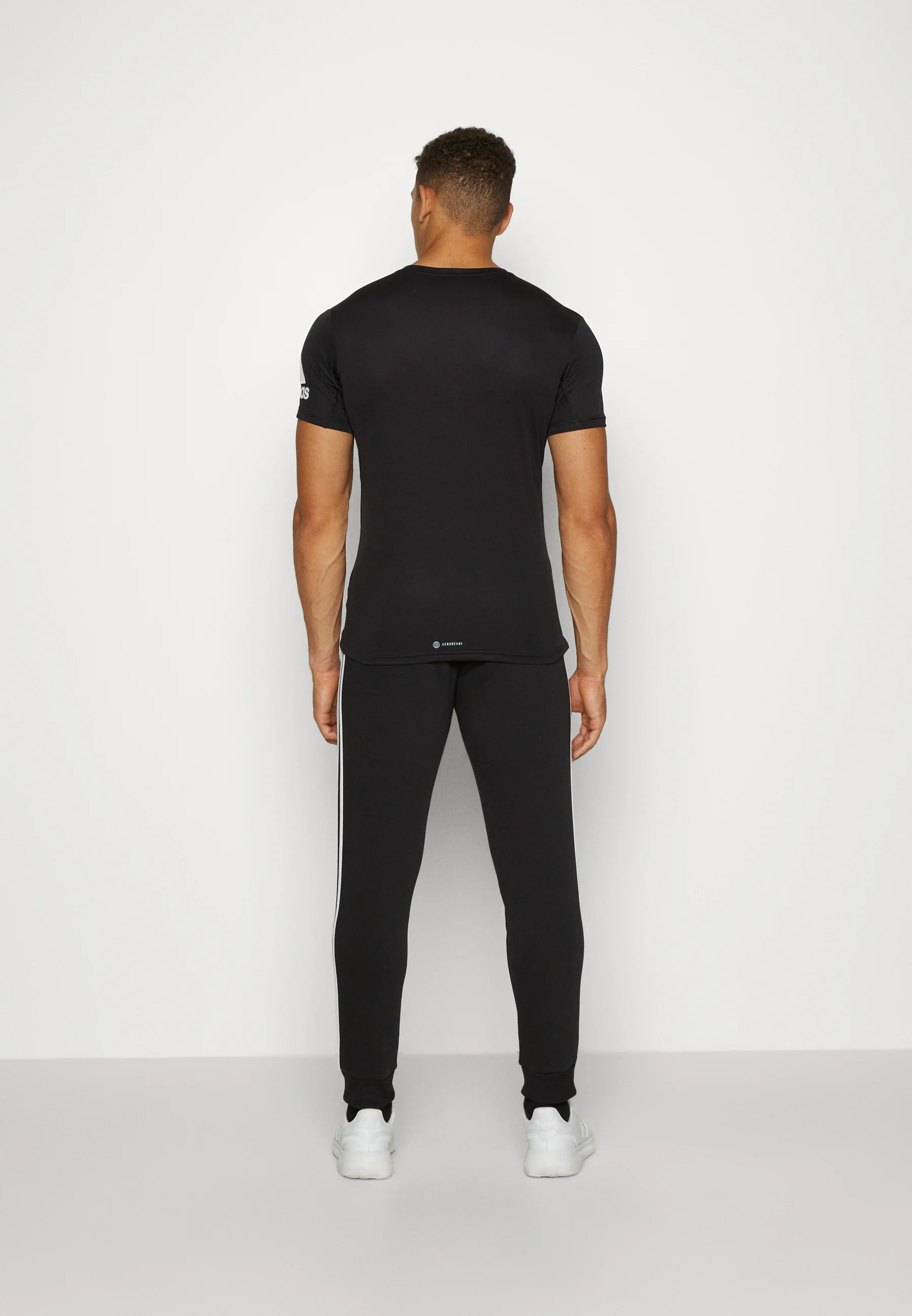 adidas Sportswear ESSENTIALS TAPERED CUFF PANTS - Pantalones deportivos