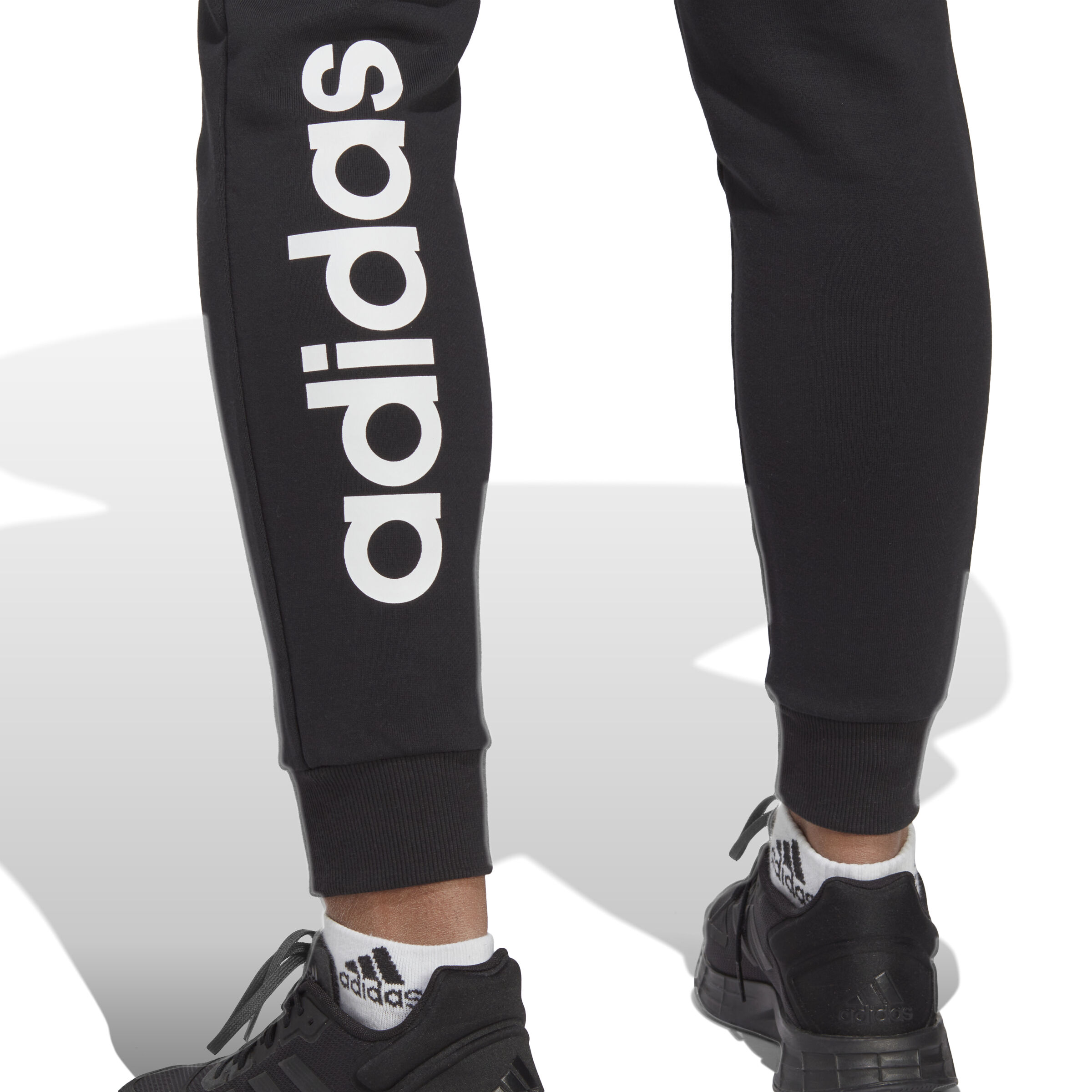 Essentials Linear French Terry Cuffed Trainingshose Damen - Schwarz, Weiß