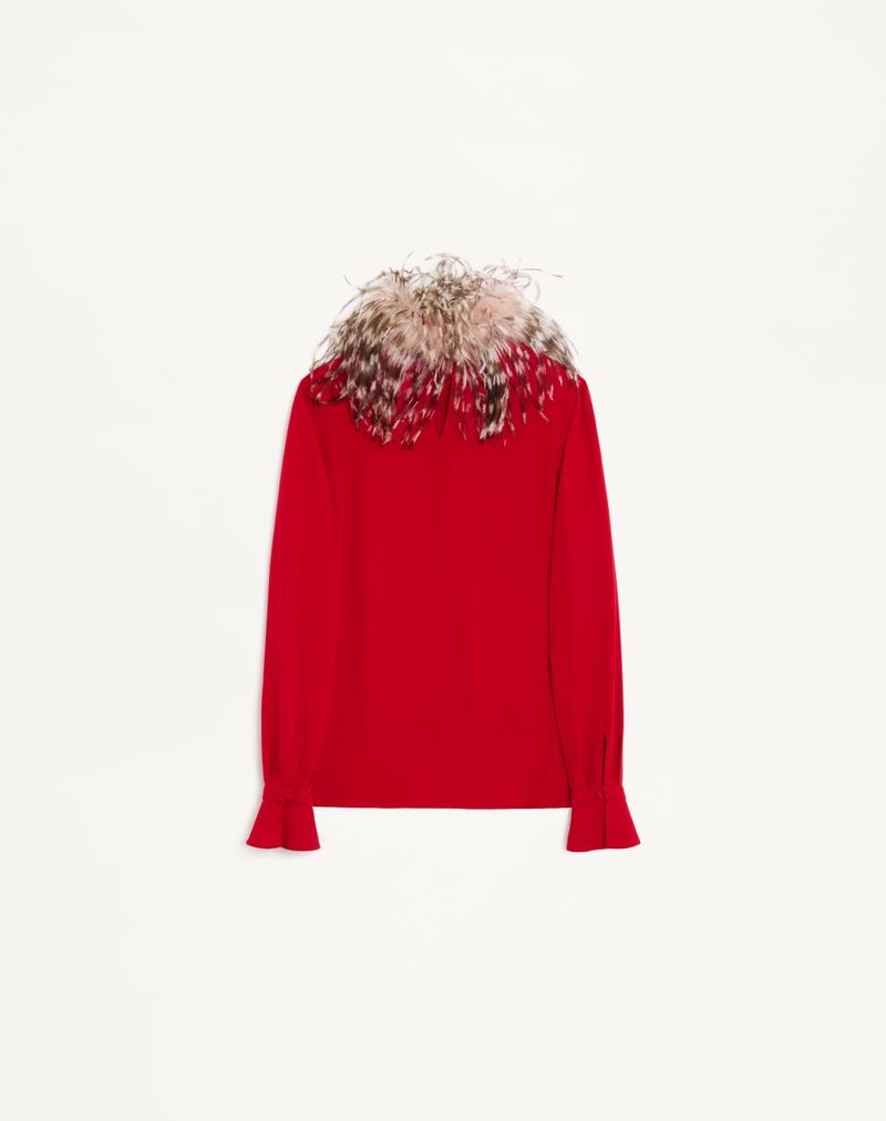 Blusa de georgette com penas