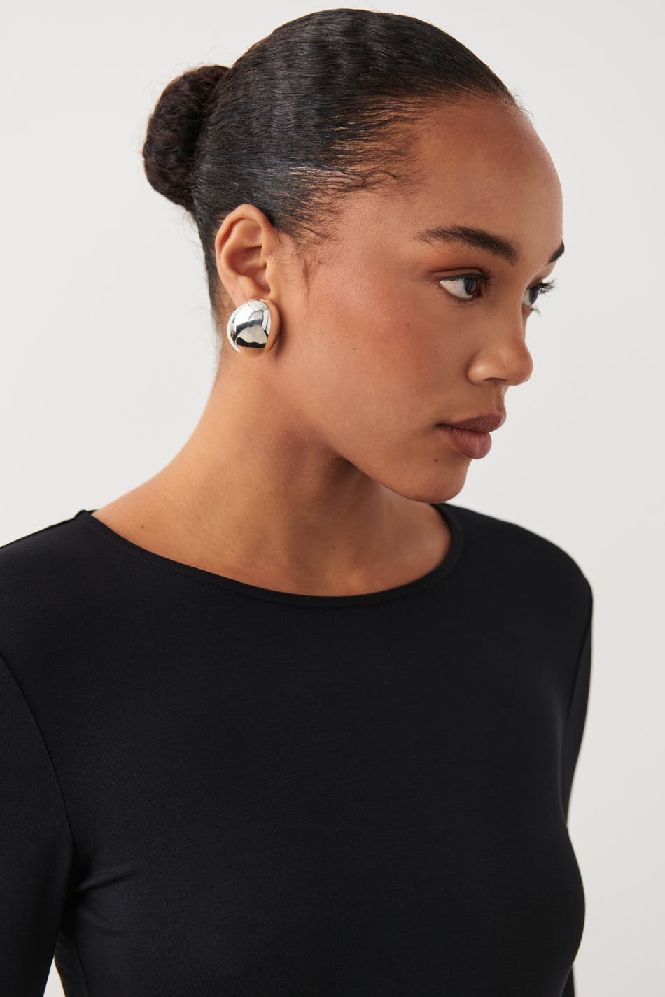 Uneven oversized earrings