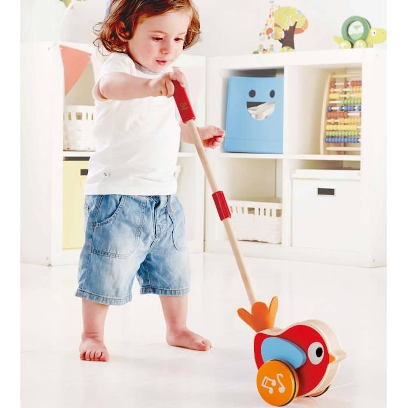 Hape Jouet à pousser musical Lilly rouge E0353 rouge