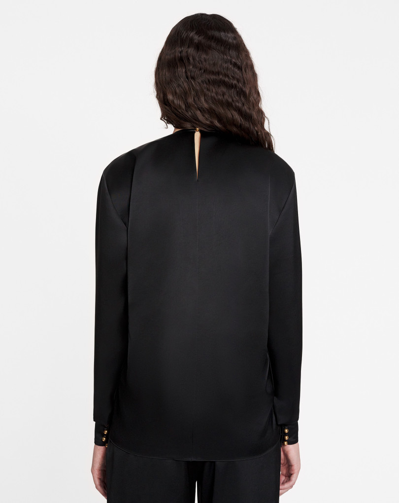 TOP DRAPÉ AVEC DÉTAIL ŒILLET