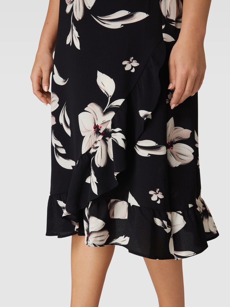 PLUS SIZE Midirock mit floralem Print in schwarz