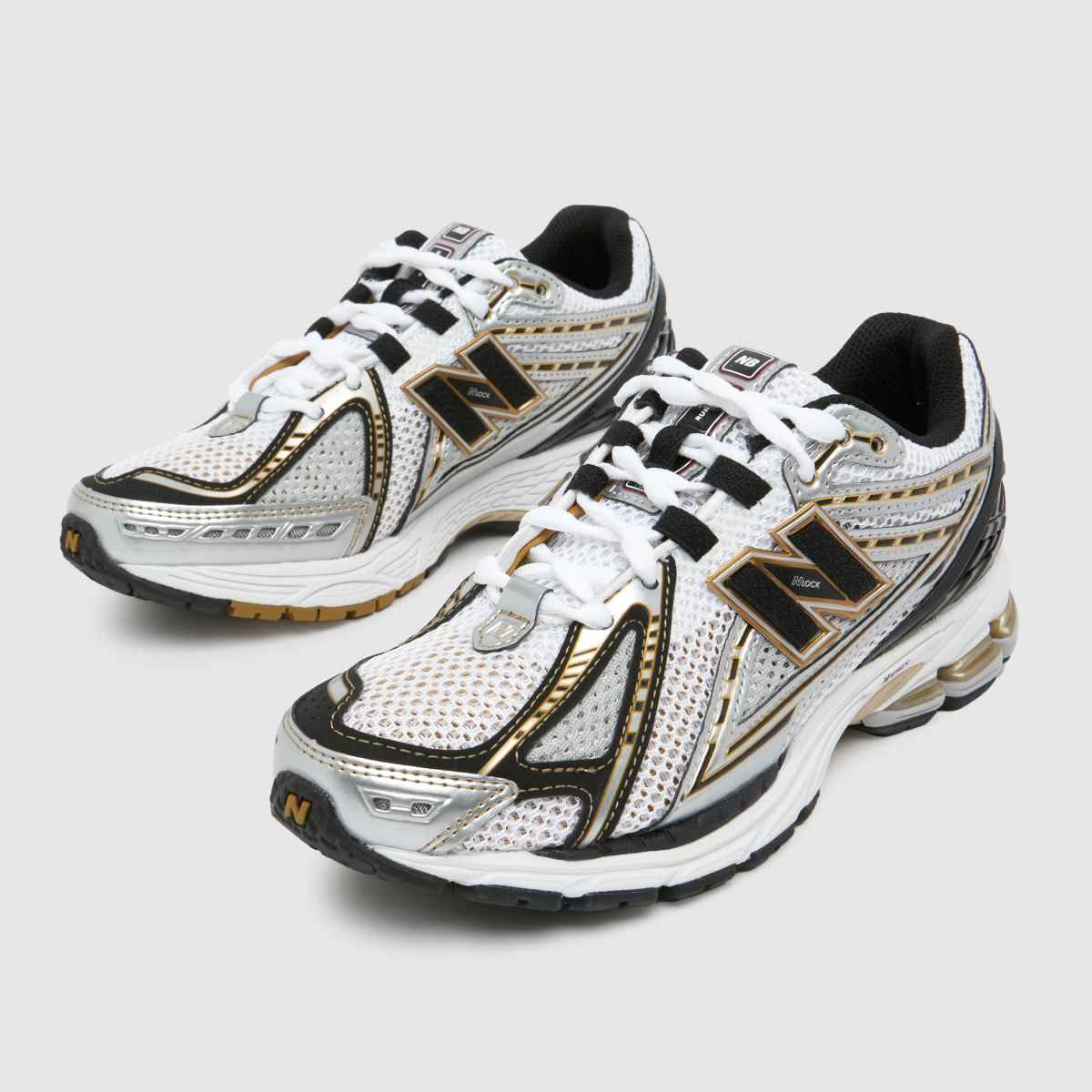 New Balance 1906r sportcipő fekete és arany színben