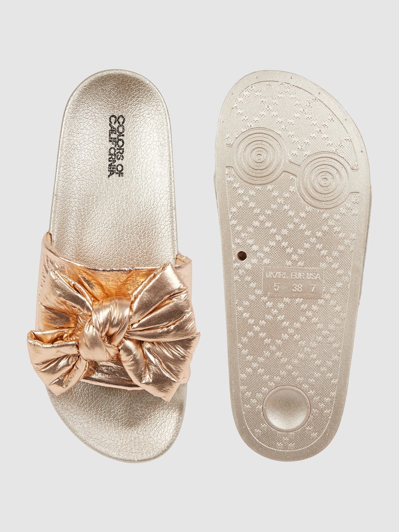 Slides in Metallic-Optik in gold