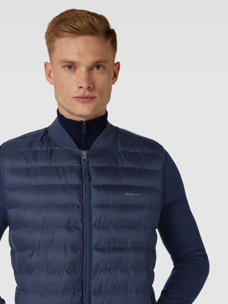 Steppweste mit Label-Print in marineblau