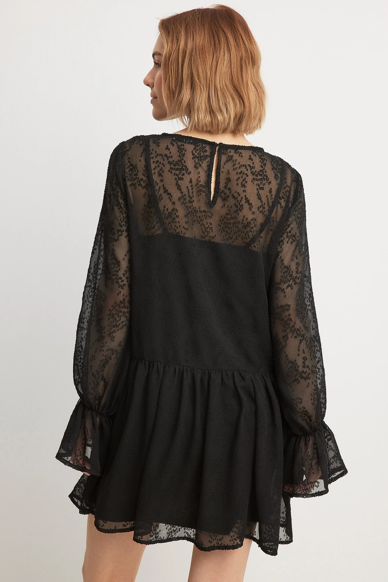 Strukturiertes Minikleid mit Faltenrock
