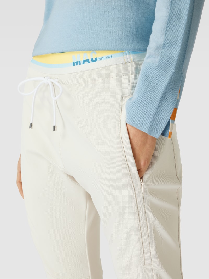 Sweatpants mit Teilungsnähten Modell 'FUTURE 4.0' in kitt