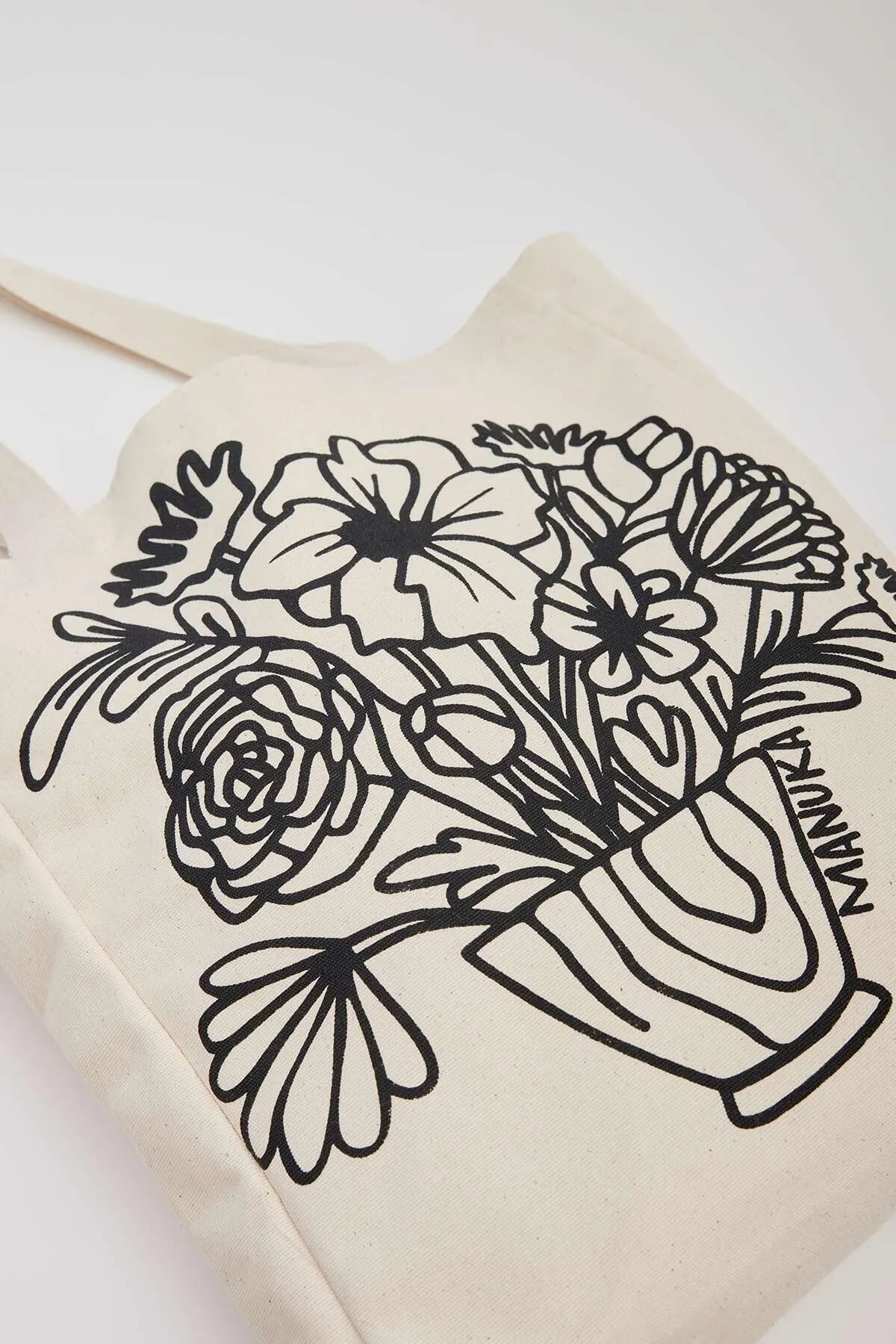 Manuka  BEDRUCKTE GÄSTESTOFFTASCHE BLUME-SCHWARZ