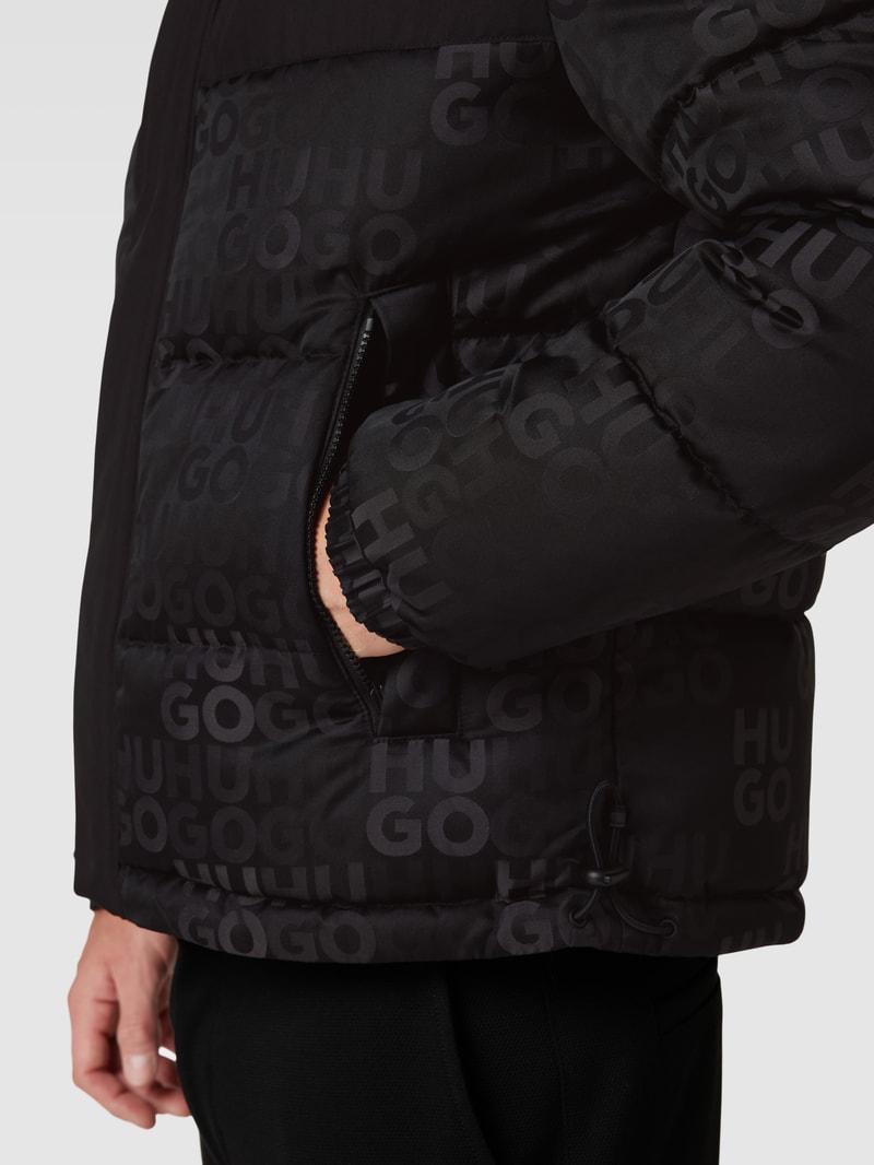 Steppjacke mit Logo-Muster Modell 'BALTO' in schwarz