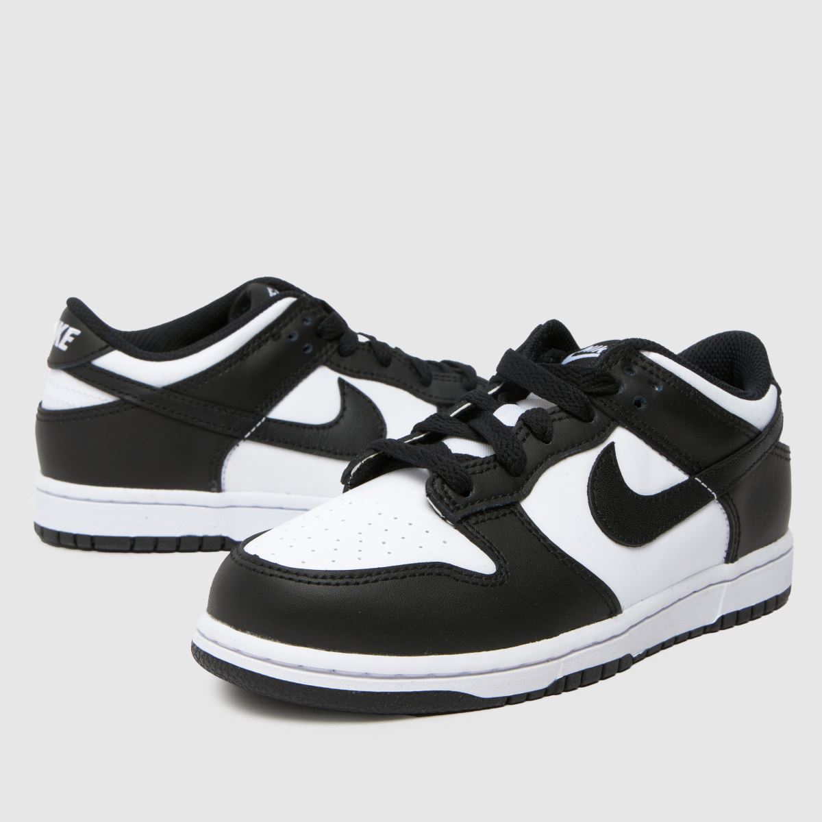 Nike Dunk Low Junior-sneakers i vitt och svart