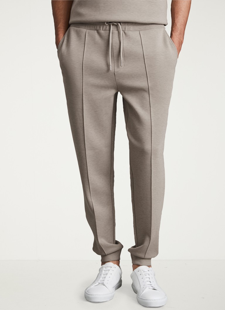 Pantaloni de trening slim fit de la Reiss Premier, cu șnur de fixare și buzunare laterale.