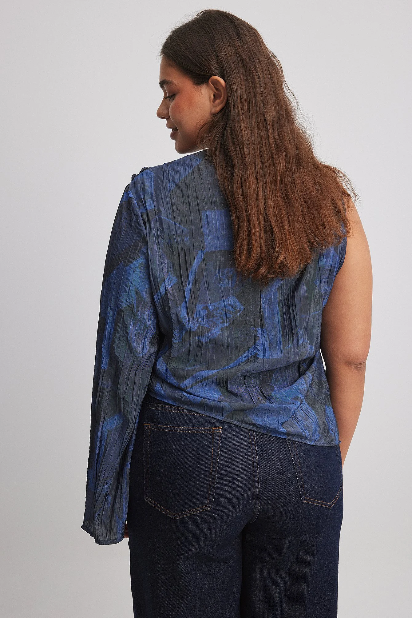 Einärmelige, asymmetrische Bluse