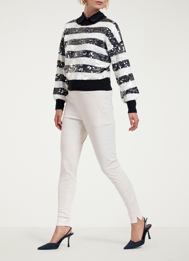 Blusa Lilly da Studio Anneloes com estampa listrada e lantejoulas.