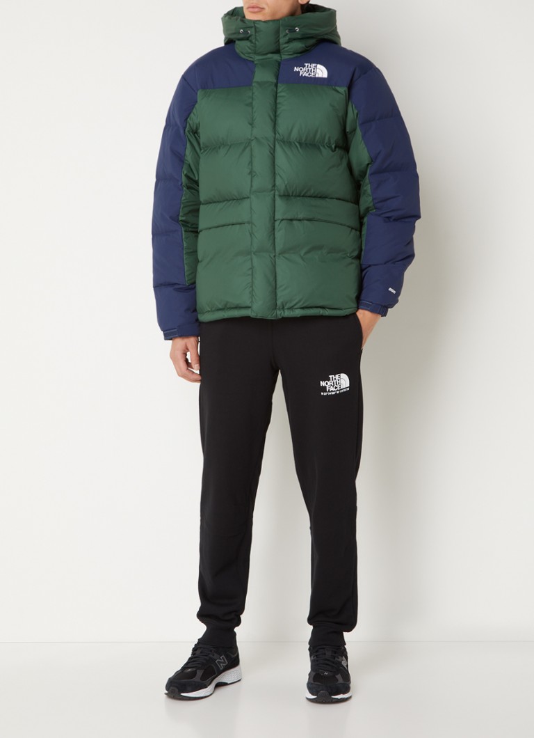 Parka acolchoada The North Face Himalayan com enchimento de plumas e bolsos com zíper.