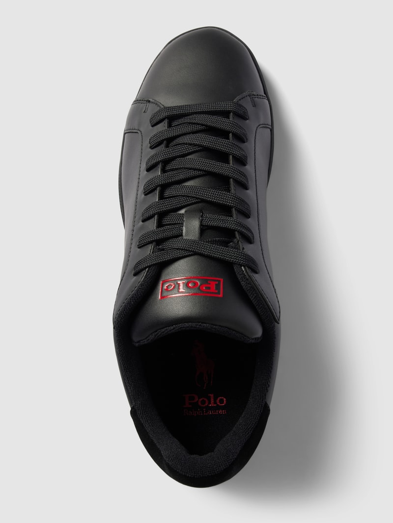 Sneaker mit Label-Details in schwarz