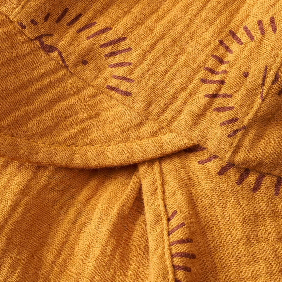 Schirmmütze aus Musselin mit Löwen-Muster, gelb, Gr. 52/53, 1 St