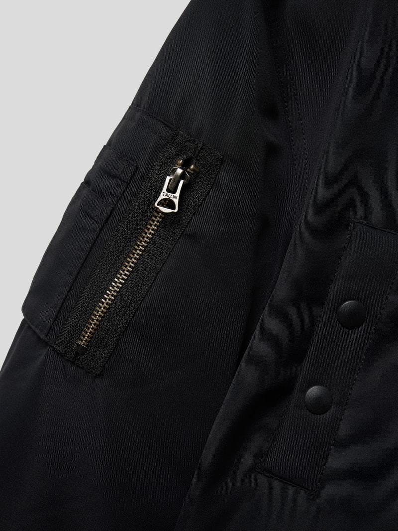 Parka mit Kunstfellbesatz in schwarz