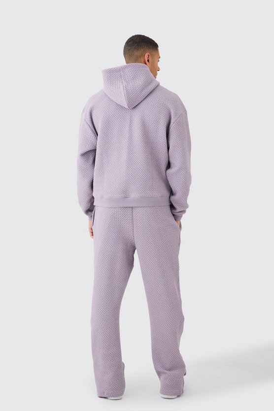 Kastiger Oversize Trainingsanzug mit Jacquard-Stickerei und Kapuze