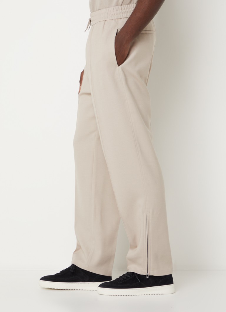 Pantaloni chino Emporio Armani, croială lejeră, din amestec de lână, cu buzunare interioare.