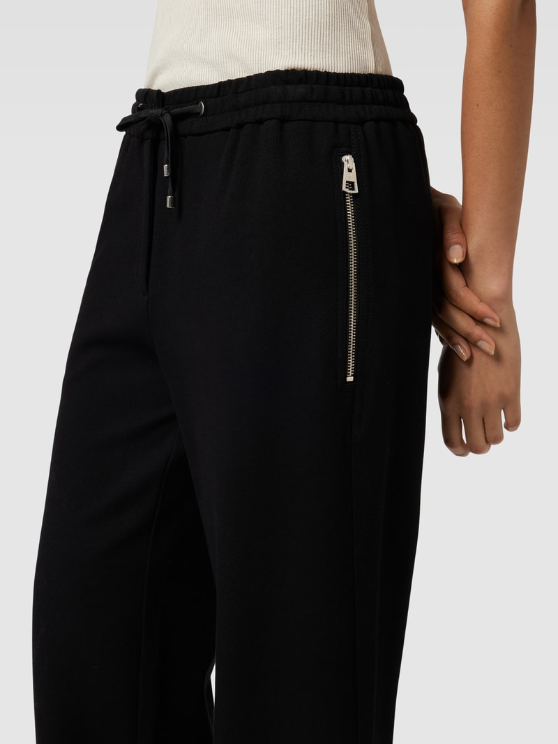 Stoffhose mit Reißverschlusstaschen in black