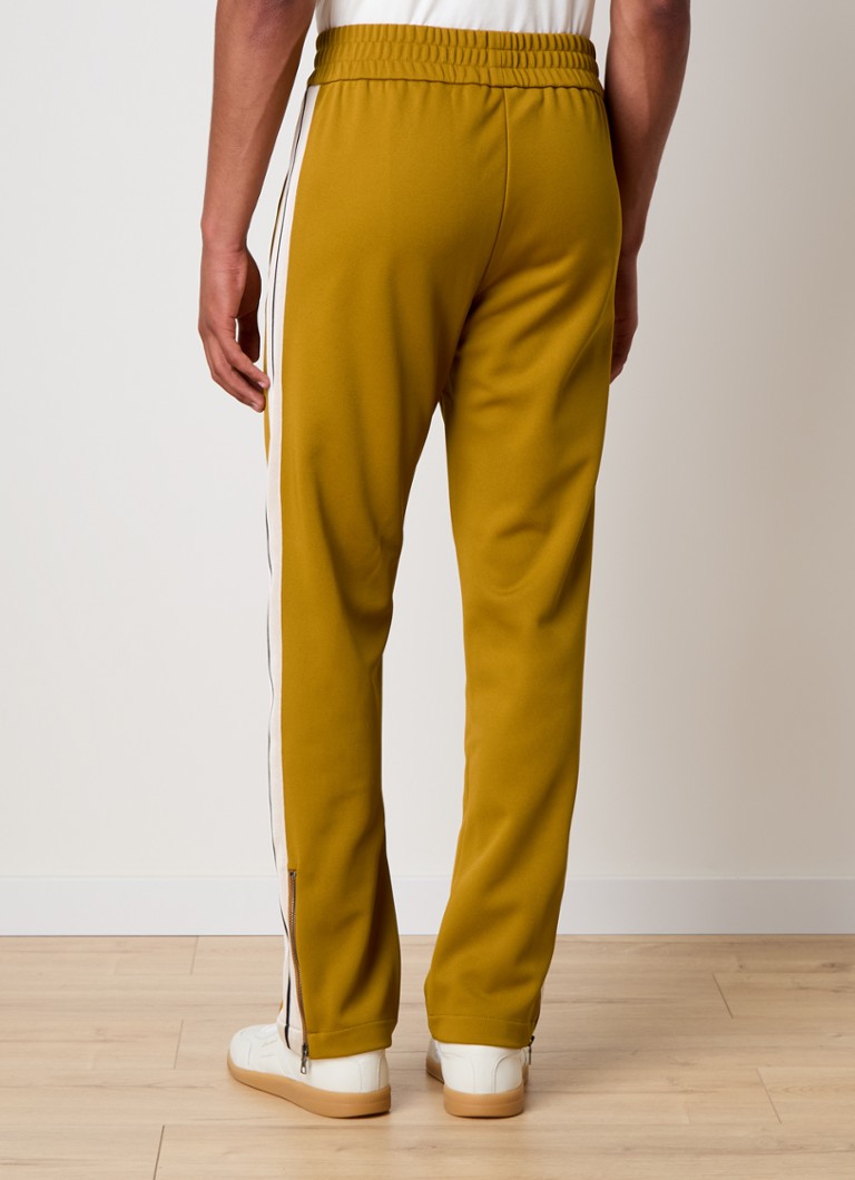 Palm Angels Tapered fit trenirke z logotipom in steekzakken