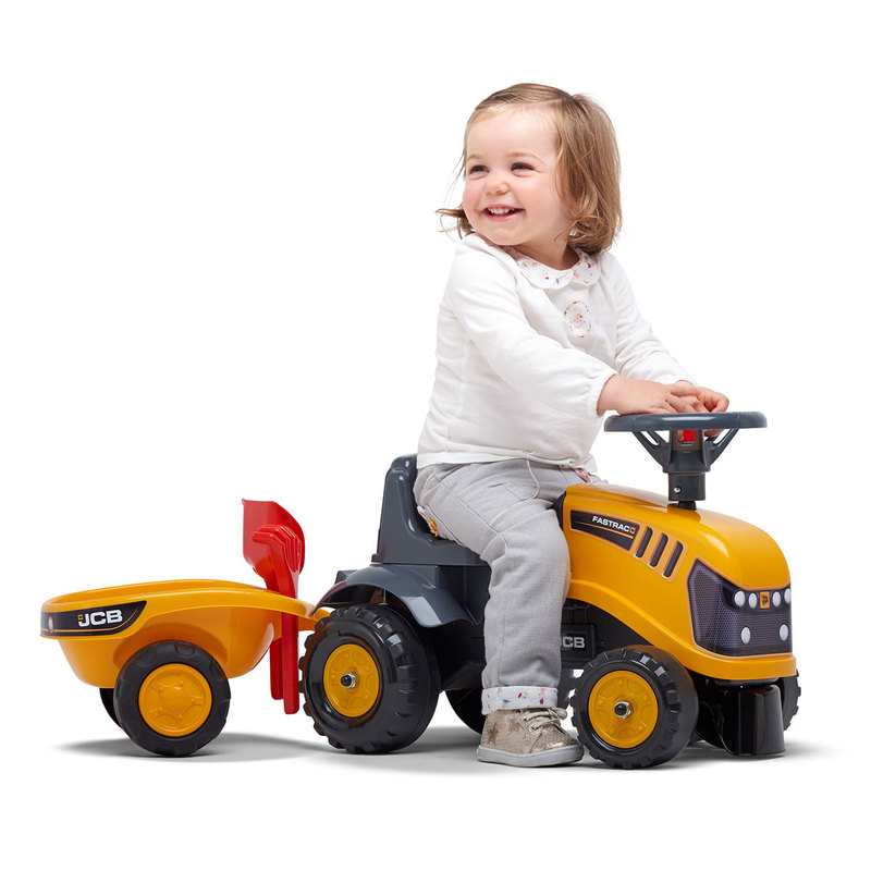 Porteur tracteur JCB avec remorque, pelle et rateau Falk