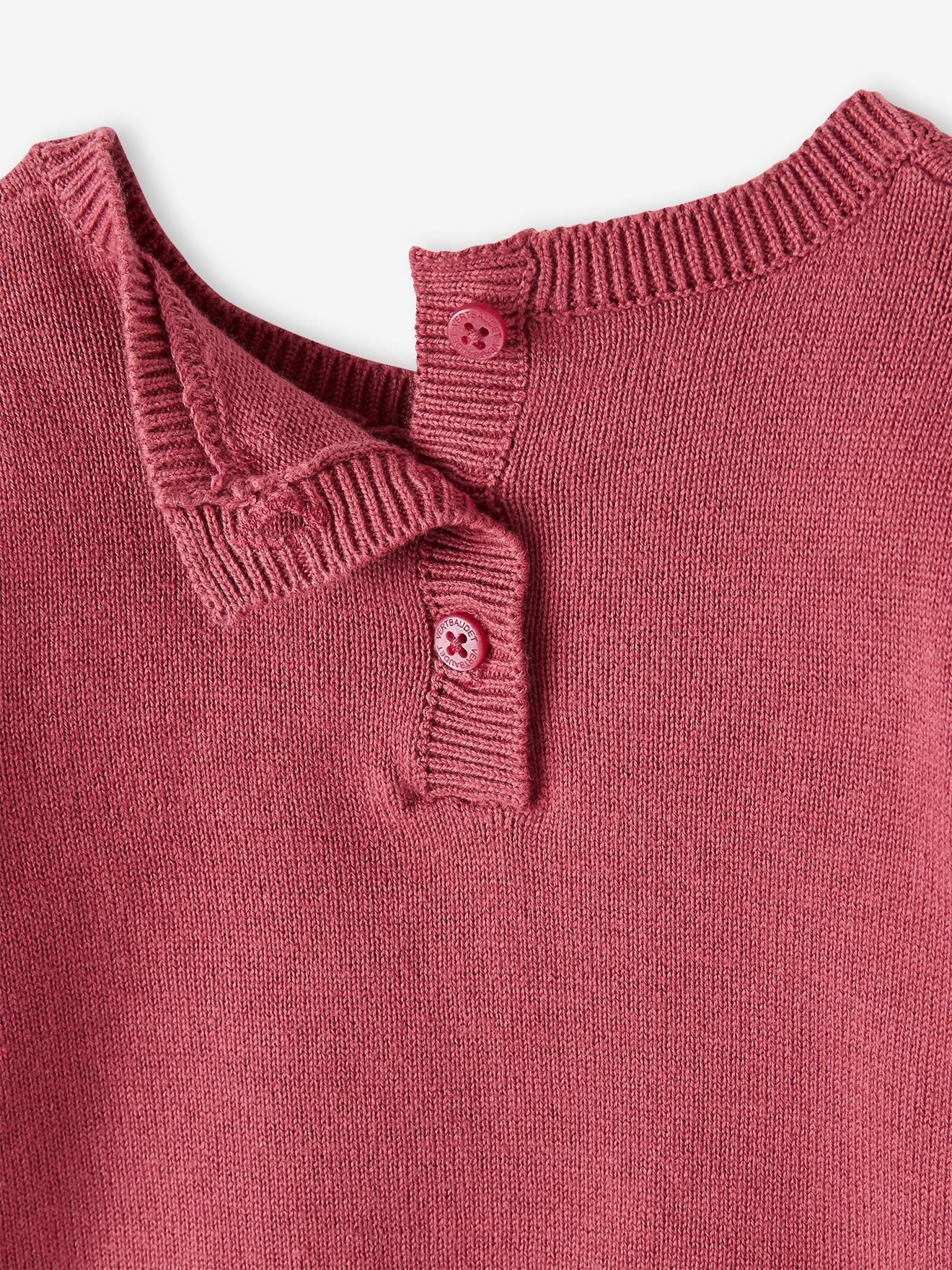 Pull à volants cerise bébé avec pompons rose