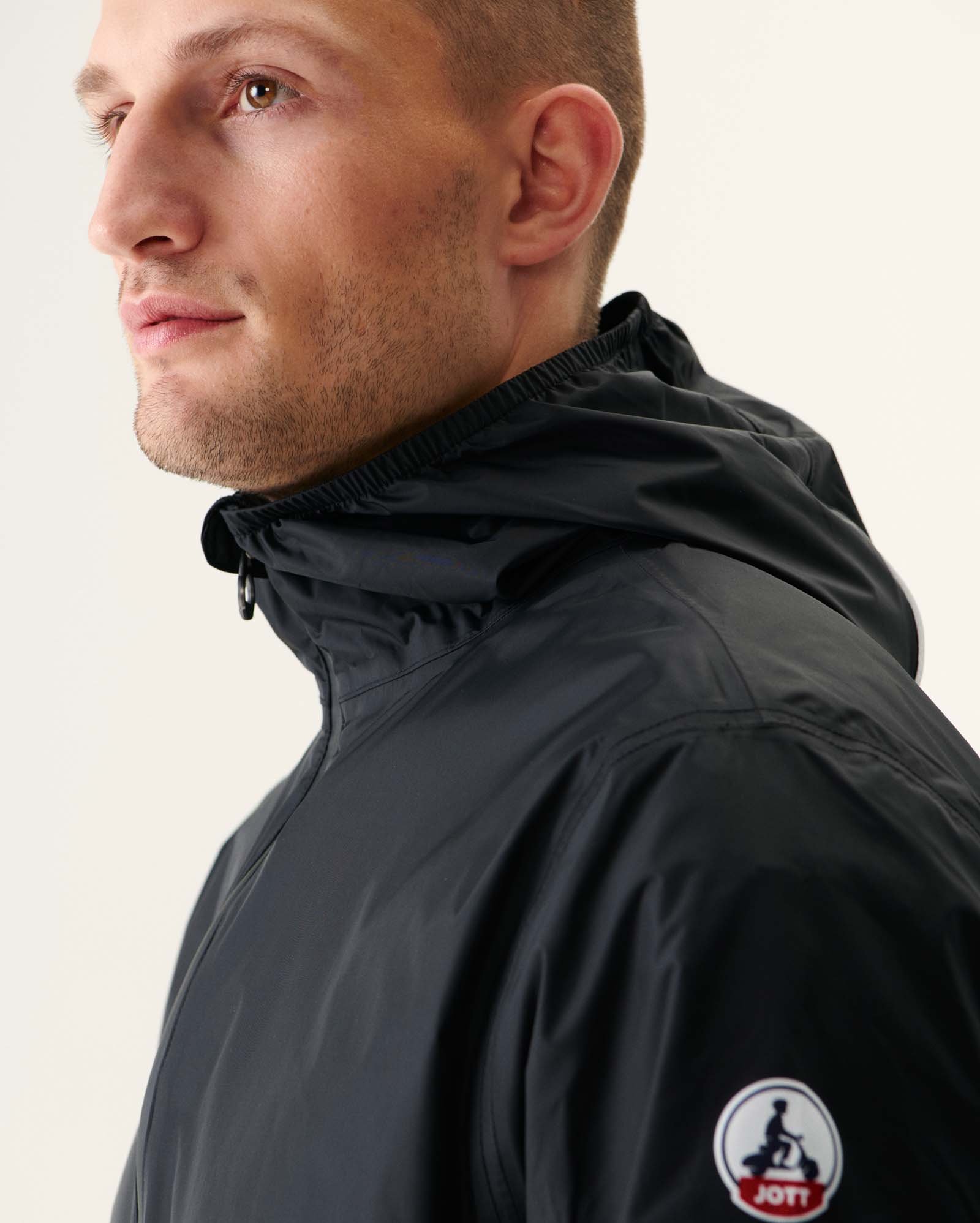 Imperméable à capuche paquetable Noir Manille