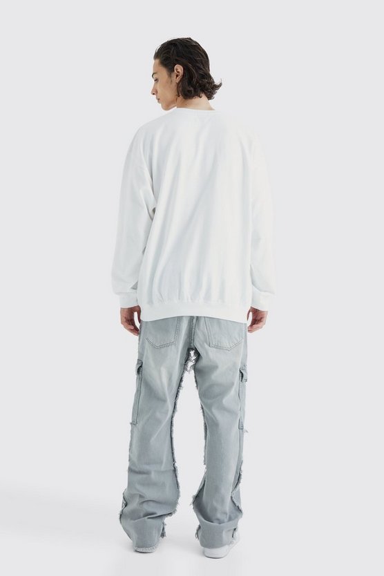 Lockere Cargo-Schlagjeans mit ausgefranstem Saum