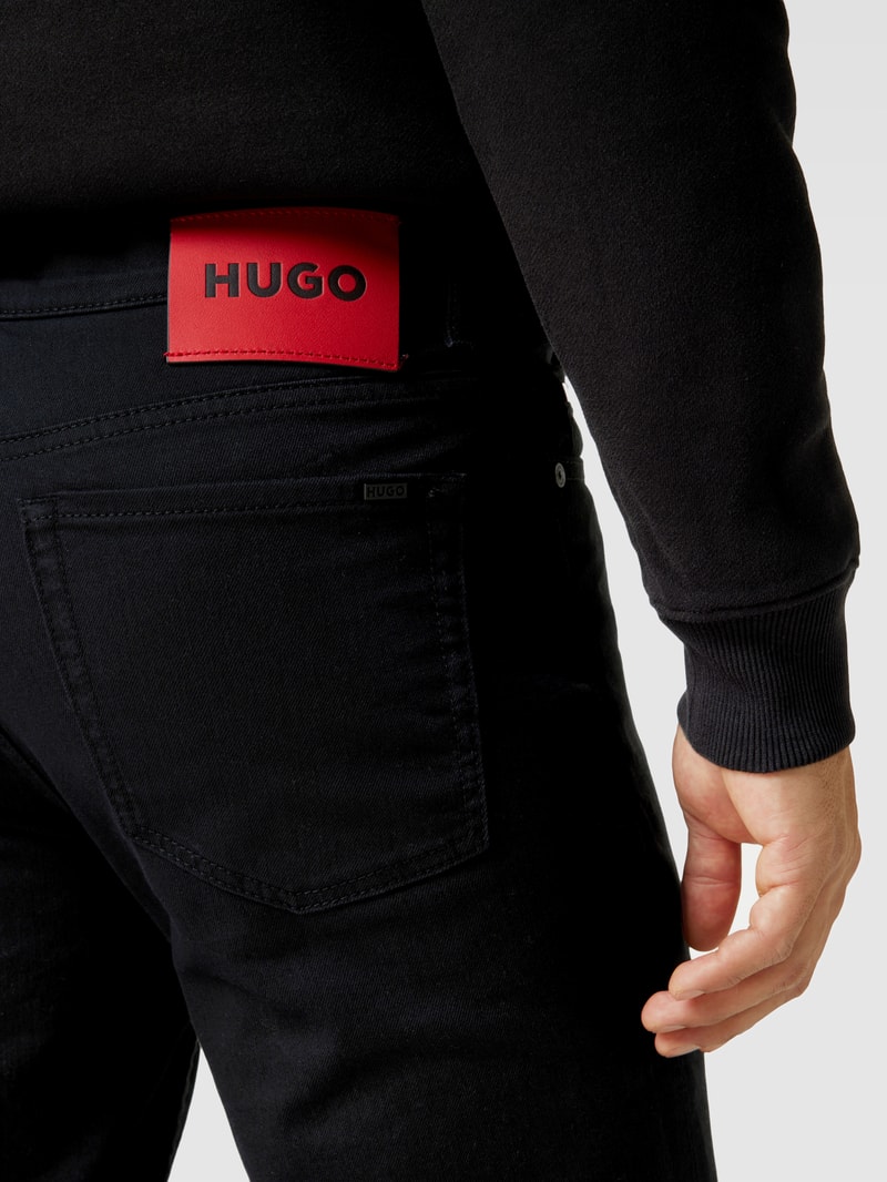 Straight Fit Jeans mit Label-Patch Modell 'HUGO 634' in schwarz