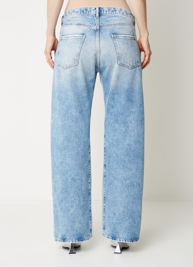 Blugi drepți cu talie înaltă de la Maison Margiela, într-o culoare deschisă.