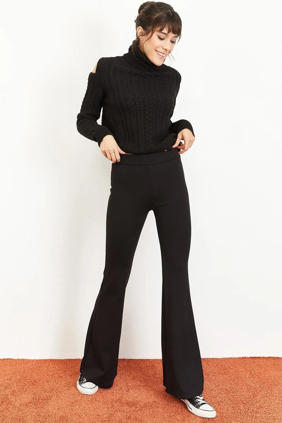Bianco Lucci  Schwarze Damen-Strumpfhose mit ausgestelltem Bein und gerafftem Stahlmuster 1008W1014