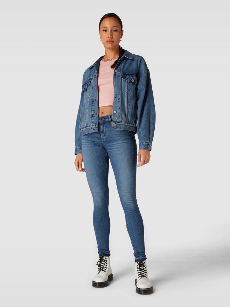 Jeans mit ausgefransten Beinabschlüssen Modell '710' in jeans