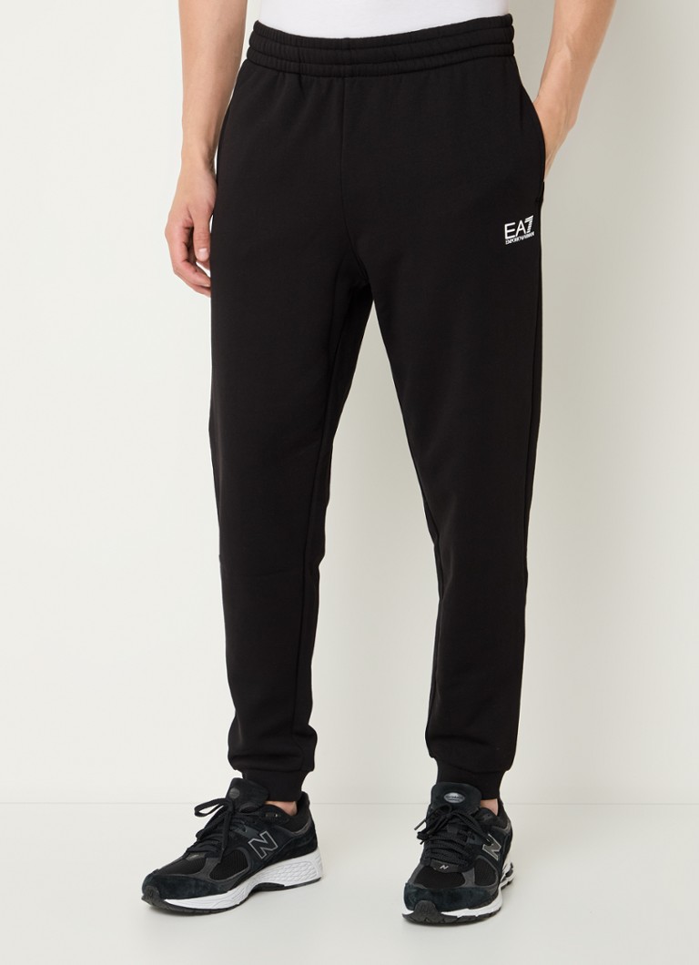 Teplákové nohavice Emporio Armani zúženého strihu s bočnými vreckami a logom