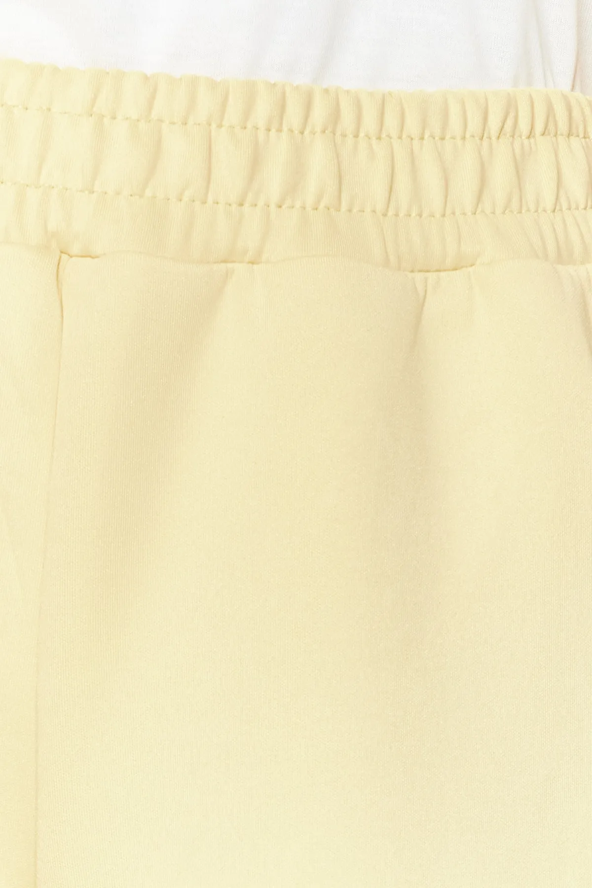 Trendyol Modest  Gelbes Strickset aus Hemd und Hose mit Taschendetail TCTSS23US00011
