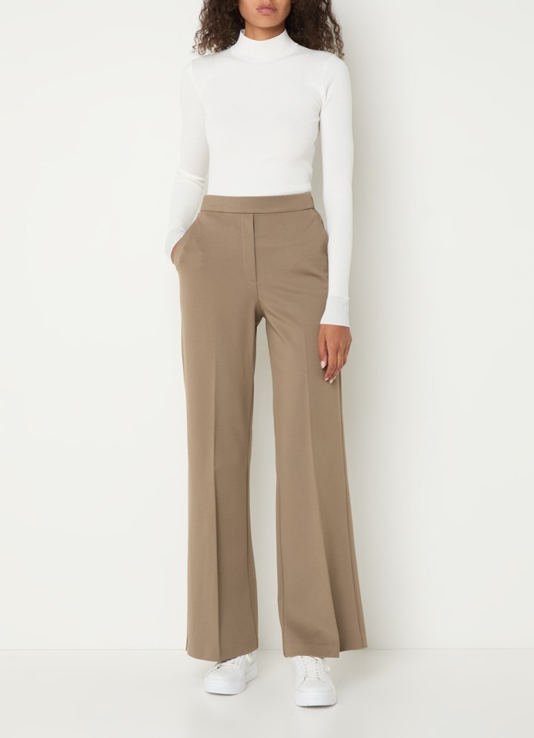 Calças Beaumont Hope de cintura alta e corte flare com bolsos laterais.