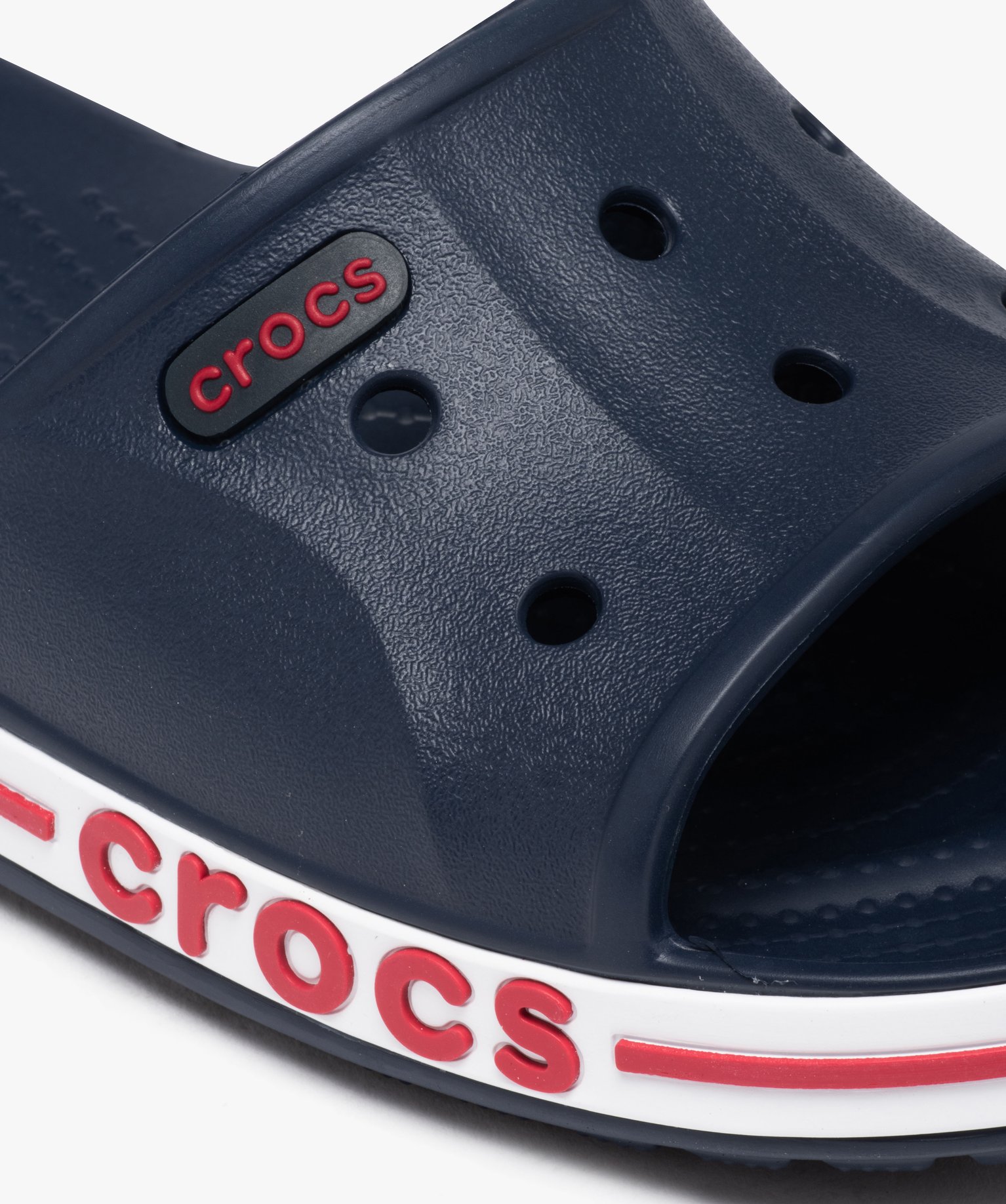 Mules de piscine homme à bandeau uni perforé - Crocs marine | GEMO