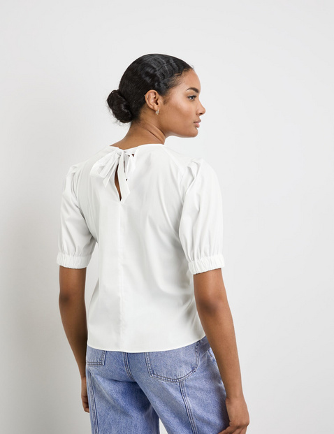 Baumwollbluse mit Volumenärmeln
