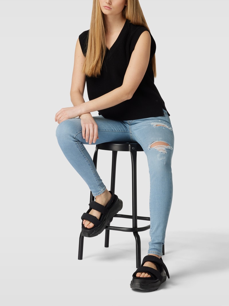 Super Skinny Fit Jeans mit Destroyed-Details Modell '710' in hellblau