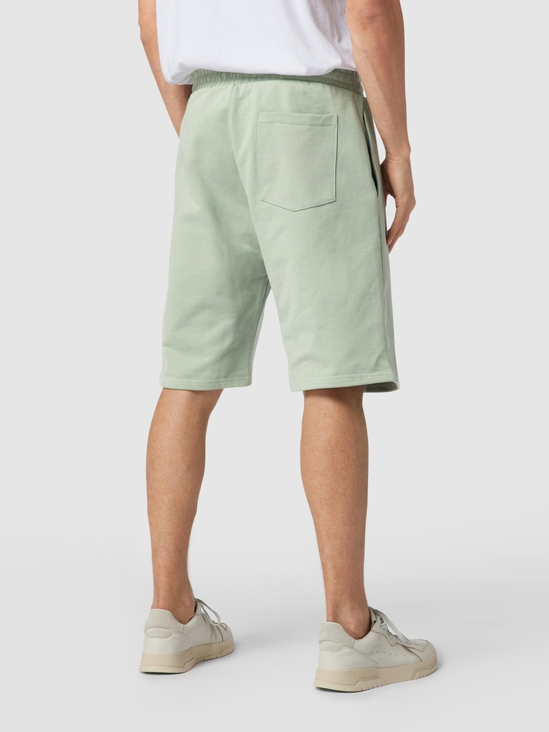 Sweatshorts mit Label-Print in lindgrün