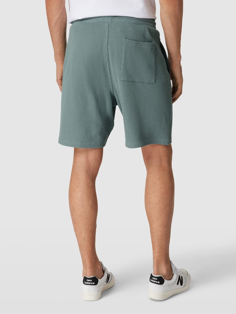 Shorts mit Strukturmuster in petrol