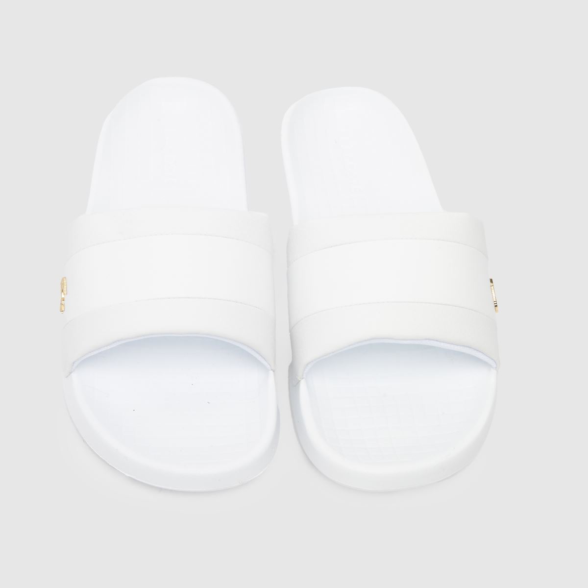 Lacoste – Serve – Vita hybridsandaler med tofs