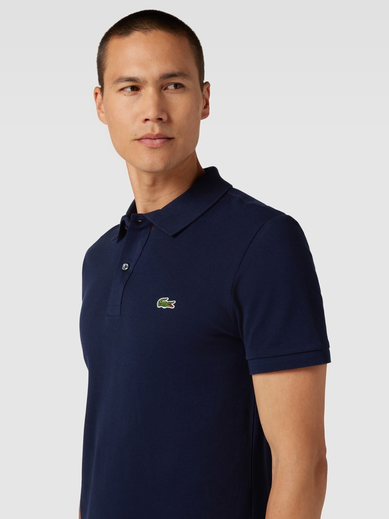 Poloshirt mit Logo-Stitching in marineblau