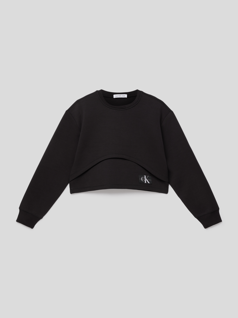 Sweatshirt in Layer-Optik in schwarz