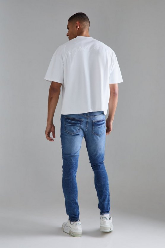 Mittelblaue Skinny Stretch Jeans mit Rissen