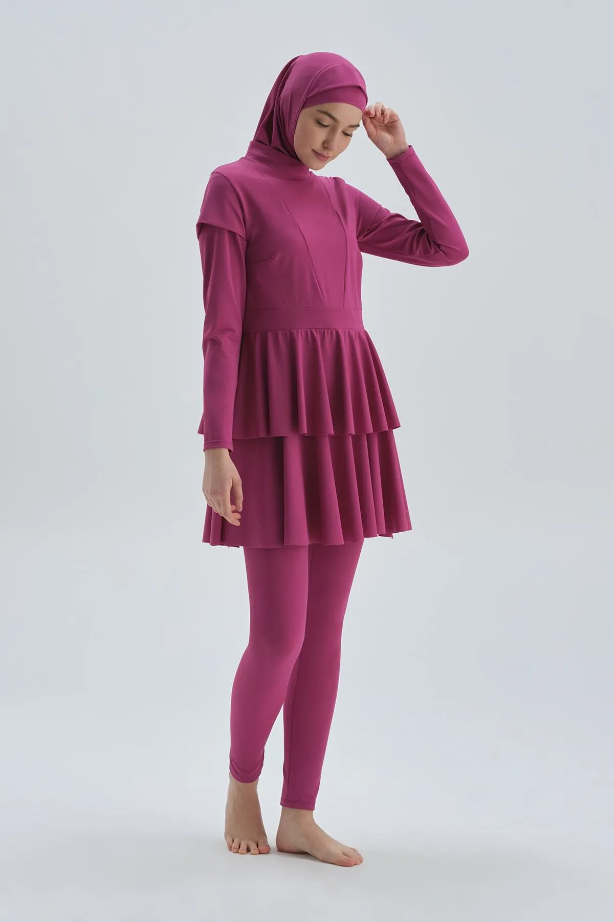 Dagi  Fuchsiafarbener, langärmliger Badeanzug mit Strumpfhosen und Kleid